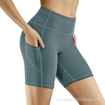 Pantalones cortos de yoga no transparentes de bolsillo